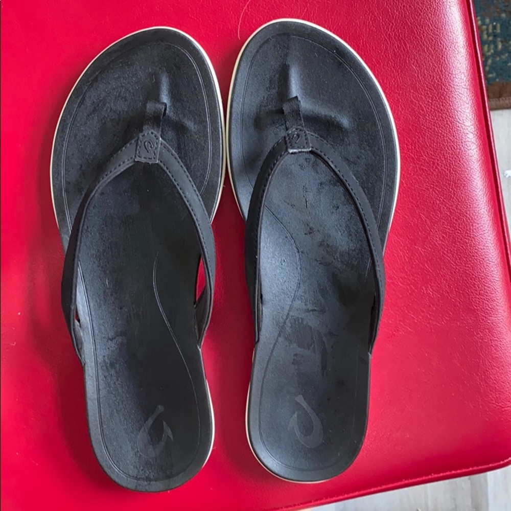 Olukai black flip flops